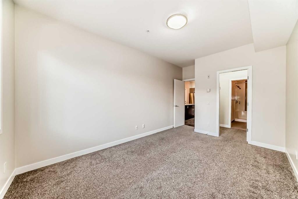 103-10 Auburn Bay Link Se, Calgary, AB - Indoor Photo Showing Other Room