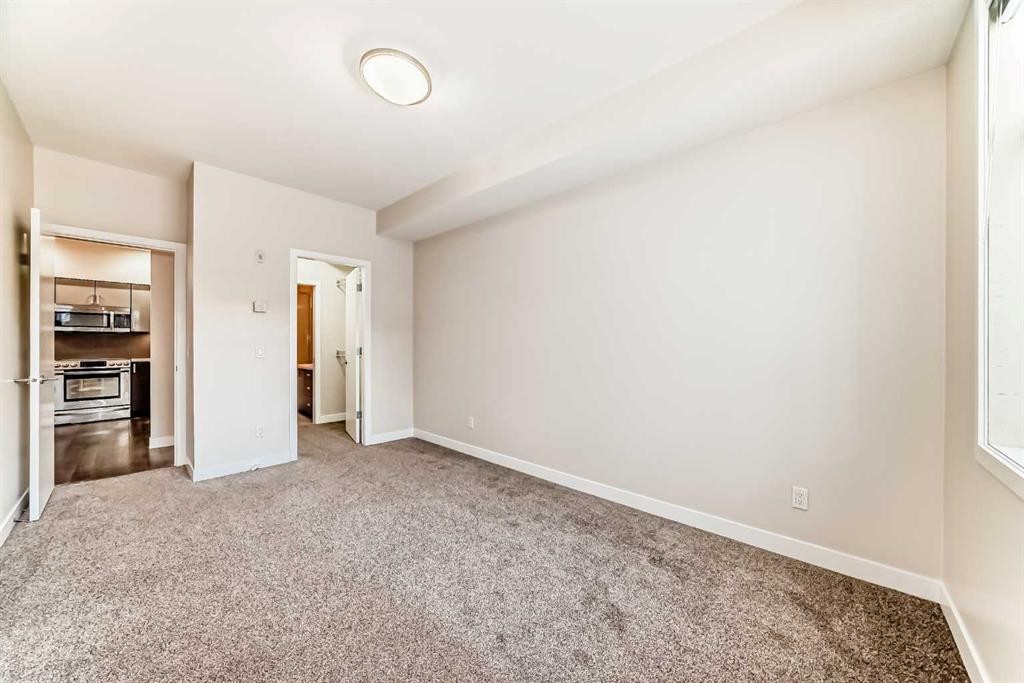 103-10 Auburn Bay Link Se, Calgary, AB - Indoor Photo Showing Other Room