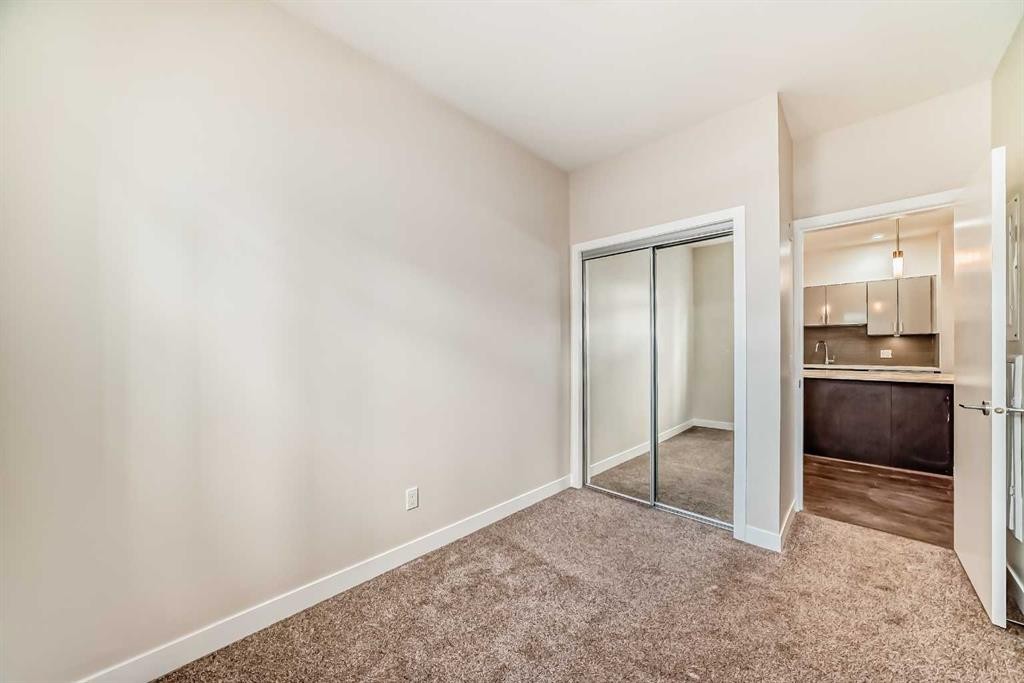 103-10 Auburn Bay Link Se, Calgary, AB - Indoor Photo Showing Other Room
