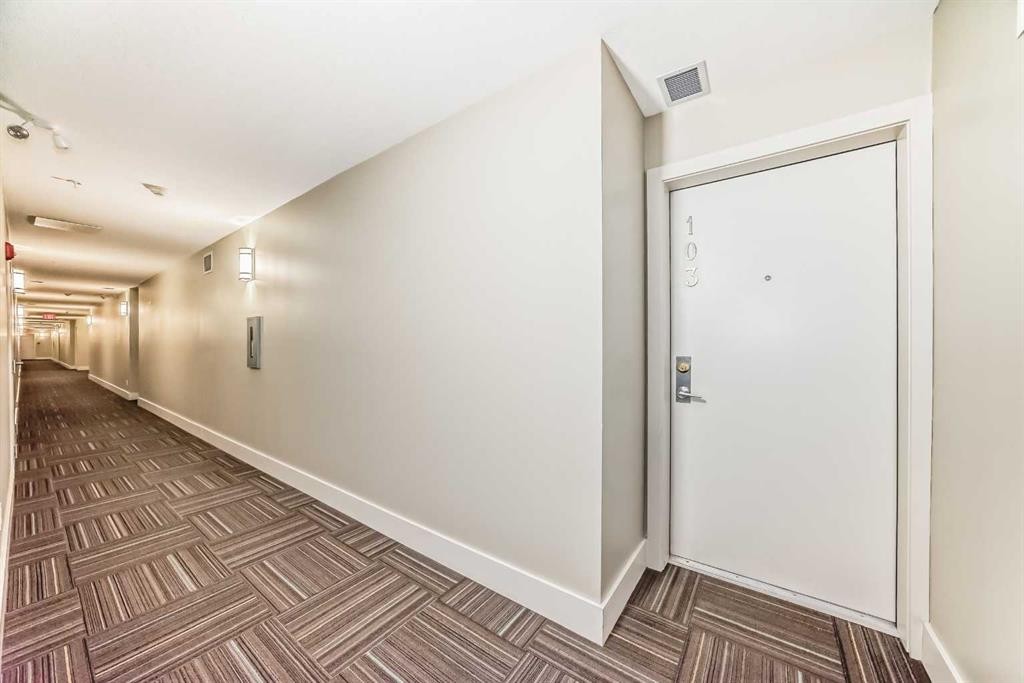103-10 Auburn Bay Link Se, Calgary, AB - Indoor Photo Showing Other Room