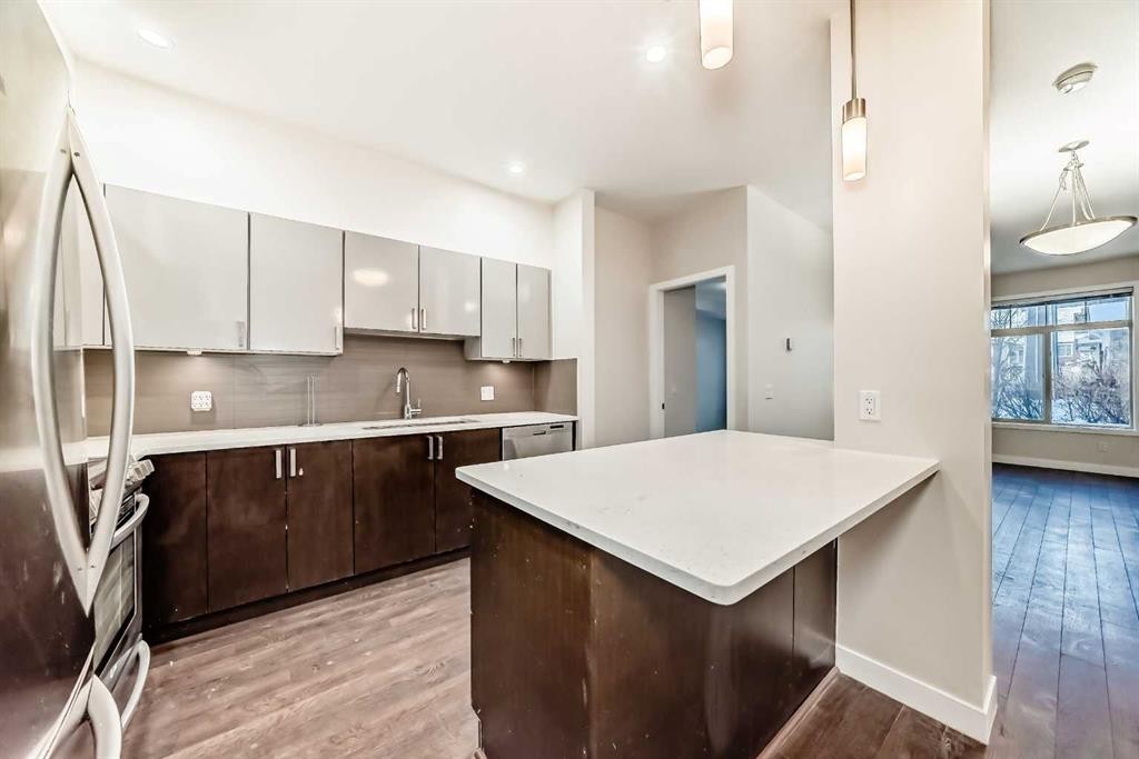 103-10 Auburn Bay Link Se, Calgary, AB - Indoor Photo Showing Kitchen With Upgraded Kitchen
