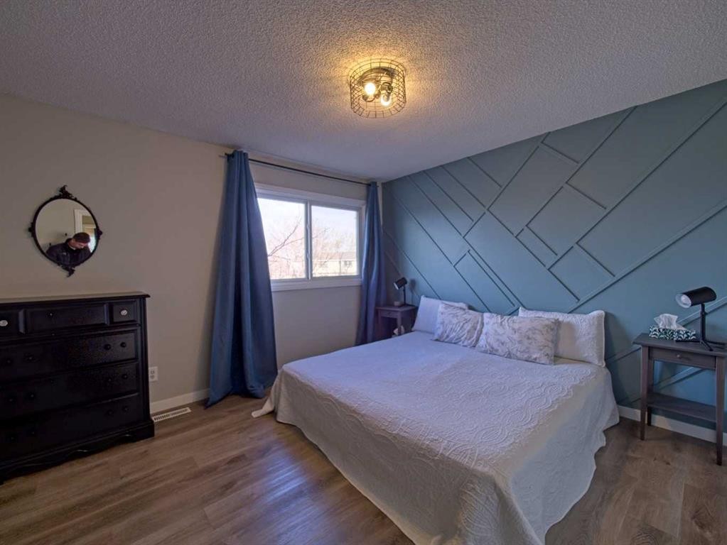 618-600 Allen Street Se, Airdrie, AB - Indoor Photo Showing Bedroom