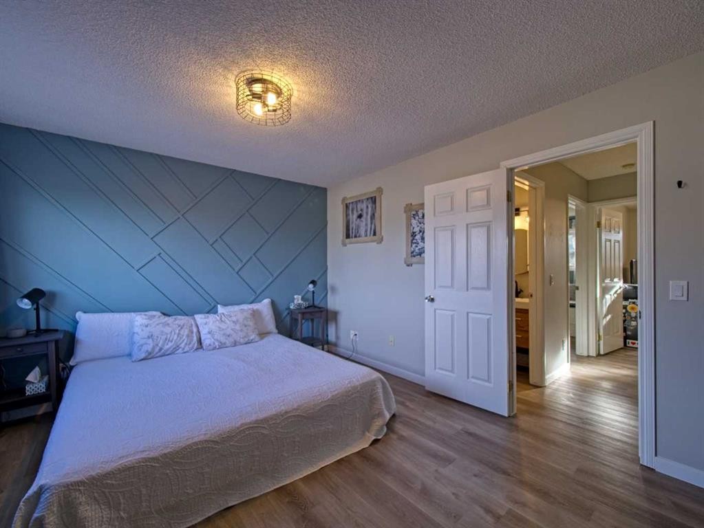 618-600 Allen Street Se, Airdrie, AB - Indoor Photo Showing Bedroom