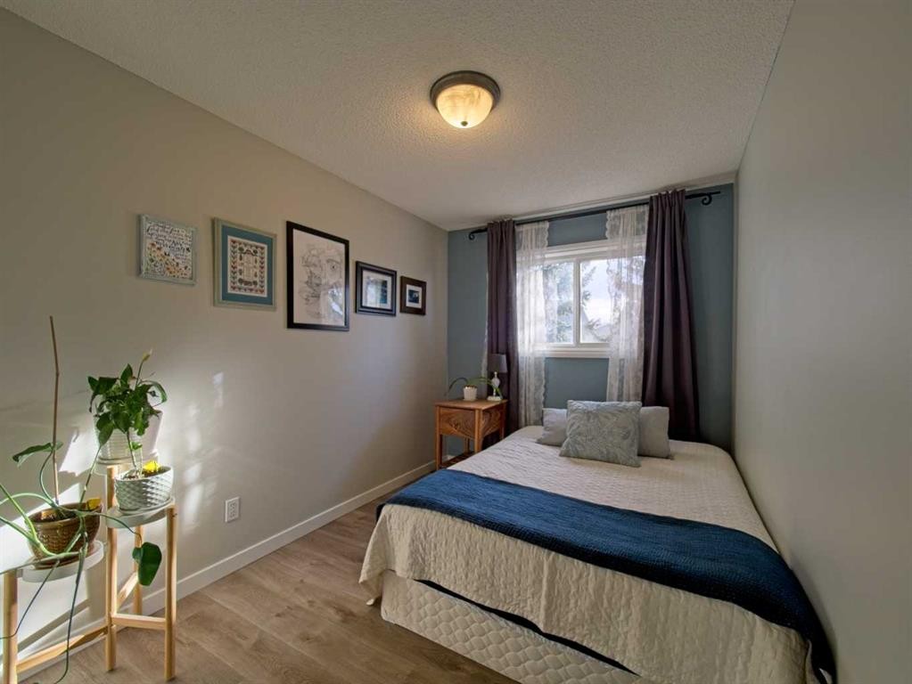 618-600 Allen Street Se, Airdrie, AB - Indoor Photo Showing Bedroom