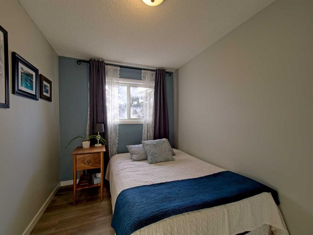 618-600 Allen Street Se, Airdrie, AB - Indoor Photo Showing Bedroom