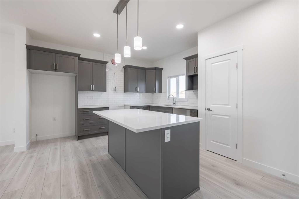 19 Appaloosa Way, Cochrane, AB - Indoor Photo Showing Kitchen