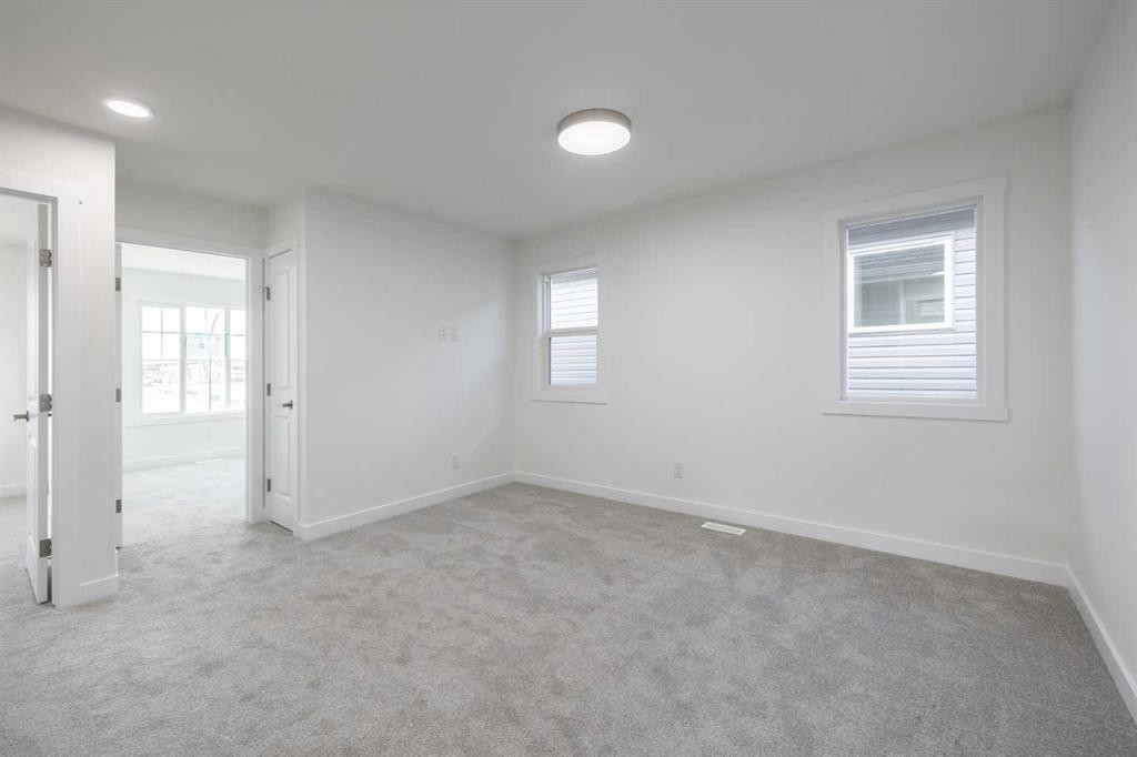 19 Appaloosa Way, Cochrane, AB - Indoor Photo Showing Other Room