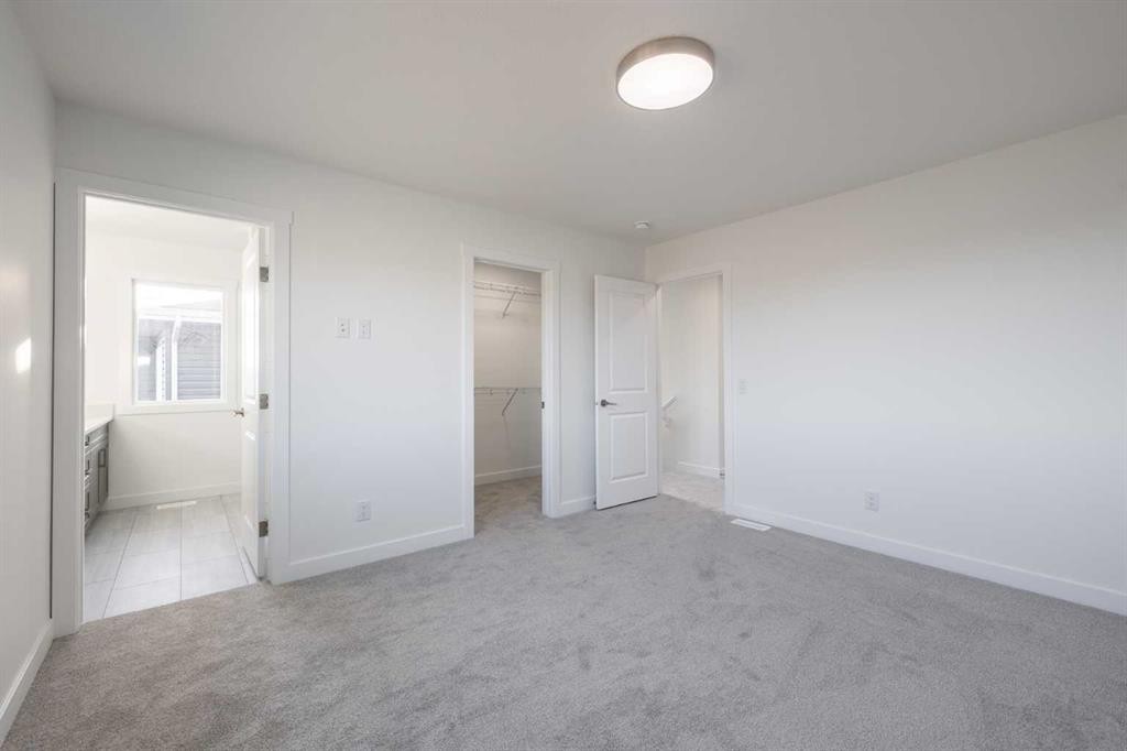 19 Appaloosa Way, Cochrane, AB - Indoor Photo Showing Other Room