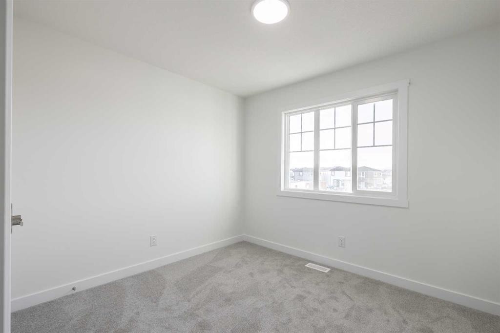 19 Appaloosa Way, Cochrane, AB - Indoor Photo Showing Other Room