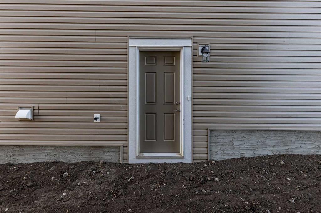 19 Appaloosa Way, Cochrane, AB - Outdoor With Exterior