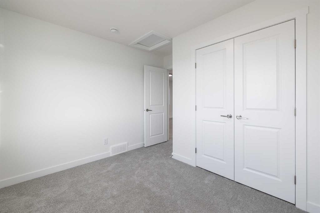 19 Appaloosa Way, Cochrane, AB - Indoor Photo Showing Other Room