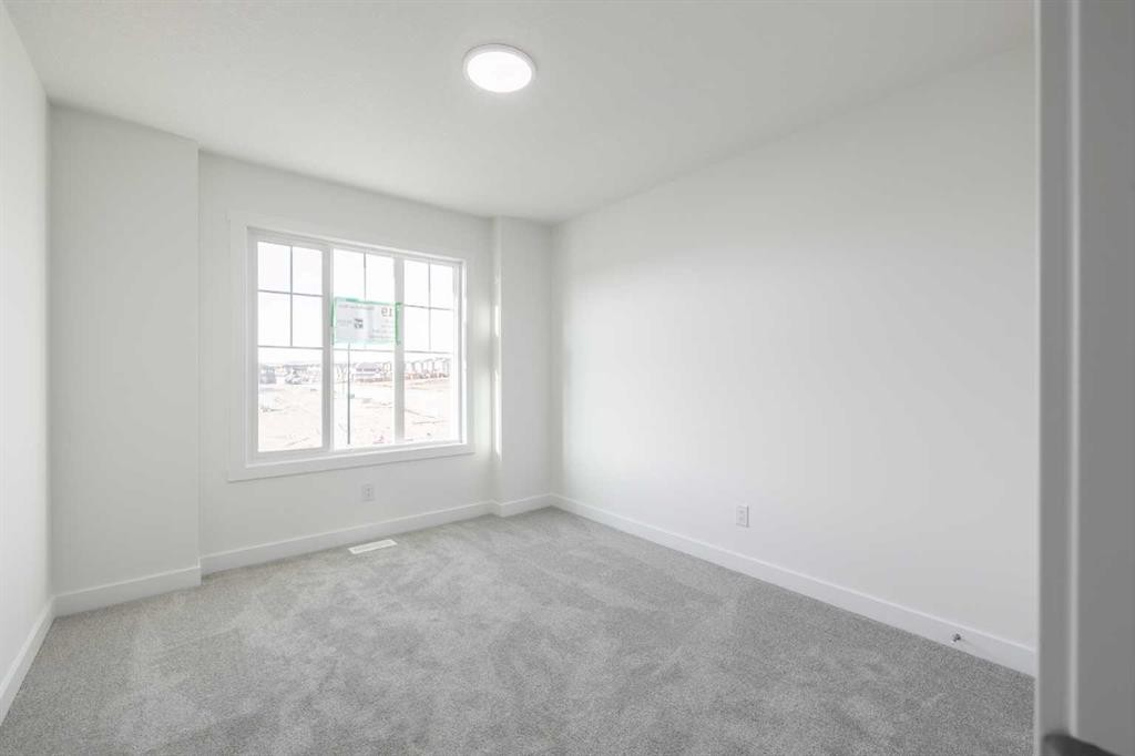 19 Appaloosa Way, Cochrane, AB - Indoor Photo Showing Other Room