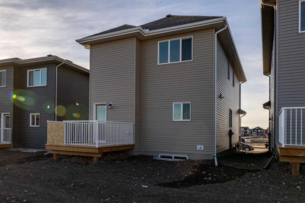 19 Appaloosa Way, Cochrane, AB - Outdoor With Exterior