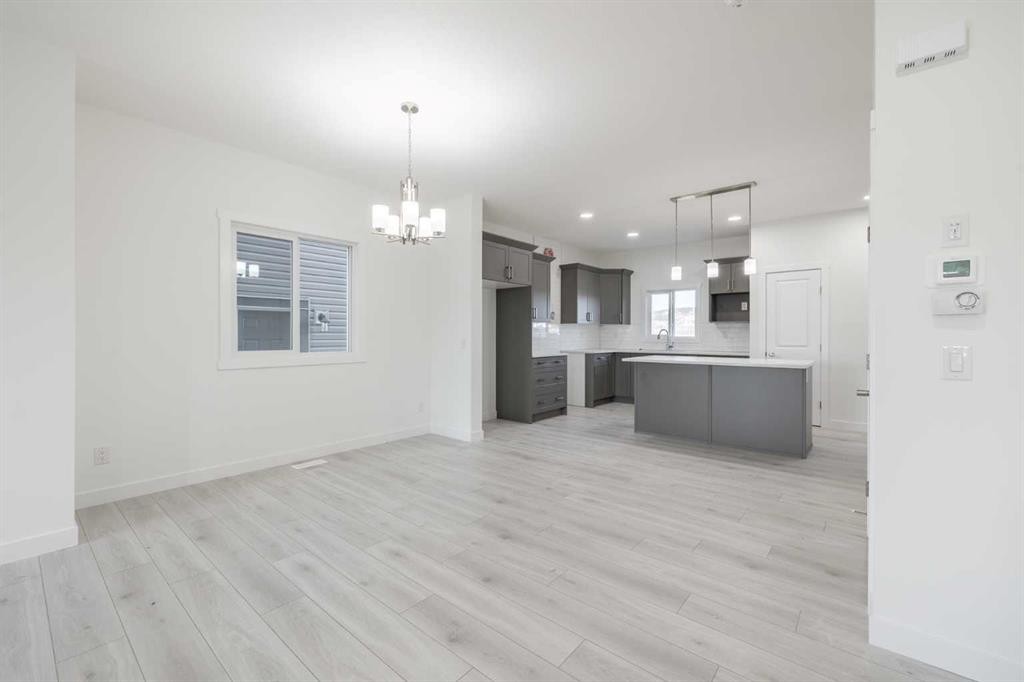 19 Appaloosa Way, Cochrane, AB - Indoor Photo Showing Kitchen