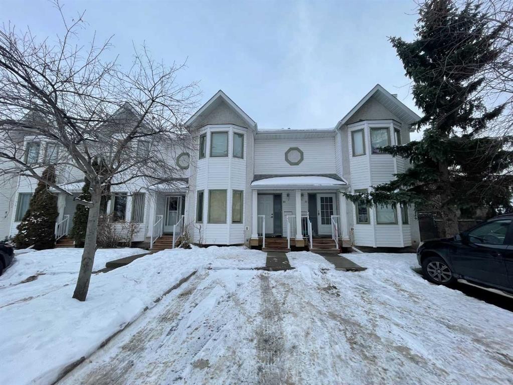 68 Abbeydale Villas Ne, Calgary, AB - Outdoor With Facade