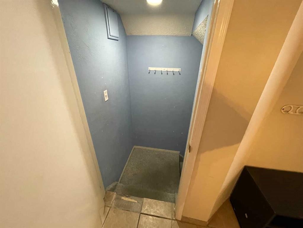 68 Abbeydale Villas Ne, Calgary, AB - Indoor Photo Showing Other Room