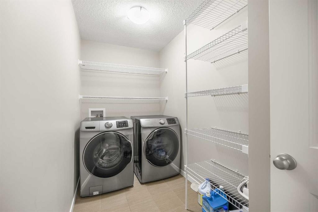 134 Howse Rise Ne, Calgary, AB - Indoor Photo Showing Laundry Room