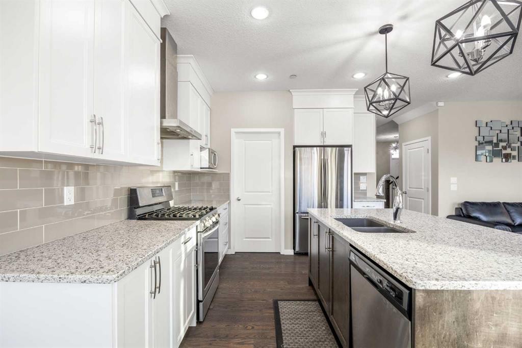 134 Howse Rise Ne, Calgary, AB - Indoor Photo Showing Kitchen With Stainless Steel Kitchen With Double Sink With Upgraded Kitchen