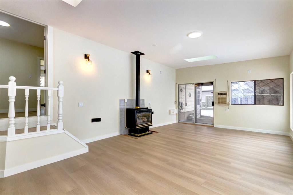 2443 42 Street Se, Calgary, AB - Indoor With Fireplace