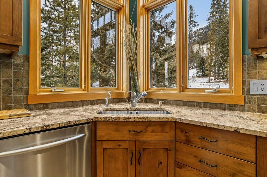 104 Stone Creek Place South, Canmore, AB - Indoor Photo Showing Kitchen With Double Sink