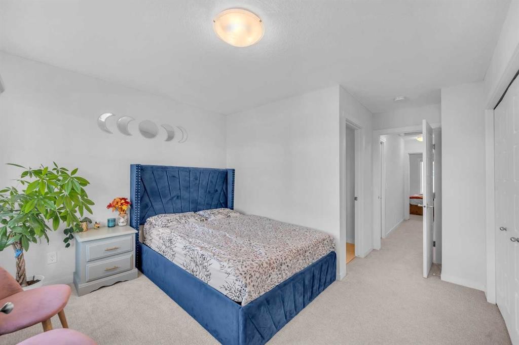 304-474 Seton Circle Se, Calgary, AB - Indoor Photo Showing Bedroom