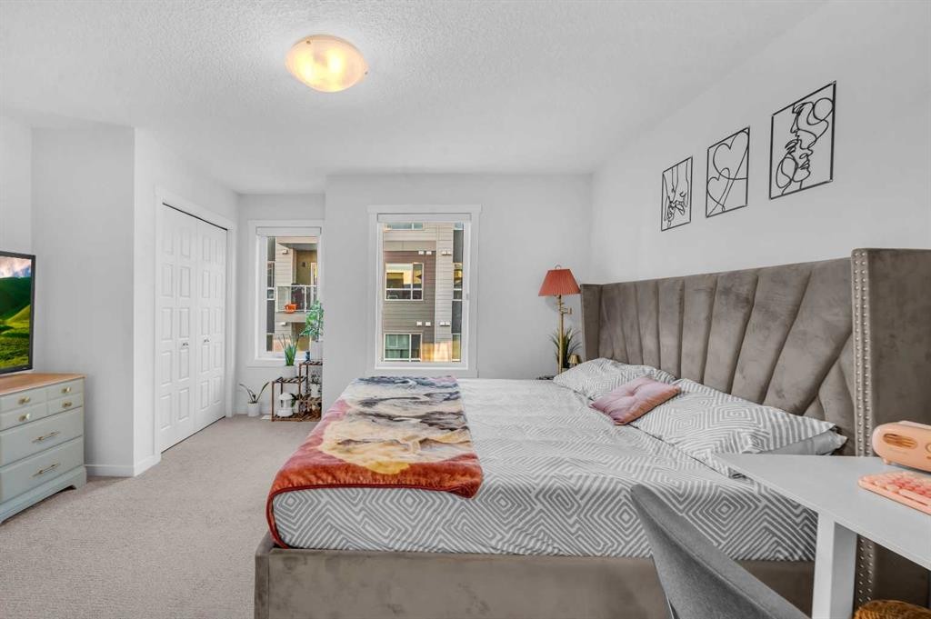 304-474 Seton Circle Se, Calgary, AB - Indoor Photo Showing Bedroom