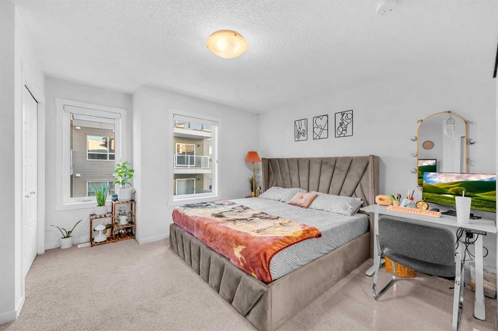 304-474 Seton Circle Se, Calgary, AB - Indoor Photo Showing Bedroom