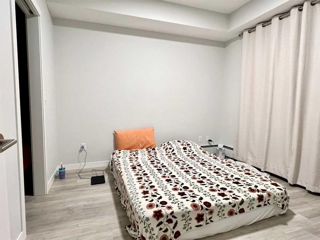 301-150 Shawnee Square Sw, Calgary, AB - Indoor Photo Showing Bedroom