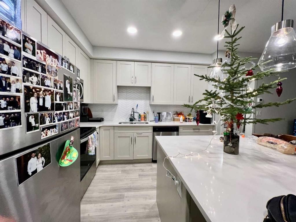 301-150 Shawnee Square Sw, Calgary, AB - Indoor Photo Showing Kitchen With Upgraded Kitchen