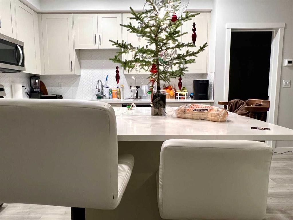 301-150 Shawnee Square Sw, Calgary, AB - Indoor Photo Showing Other Room