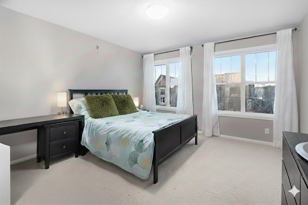 802 Walden Drive Se, Calgary, AB - Indoor Photo Showing Bedroom