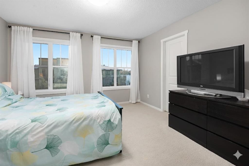 802 Walden Drive Se, Calgary, AB - Indoor Photo Showing Bedroom