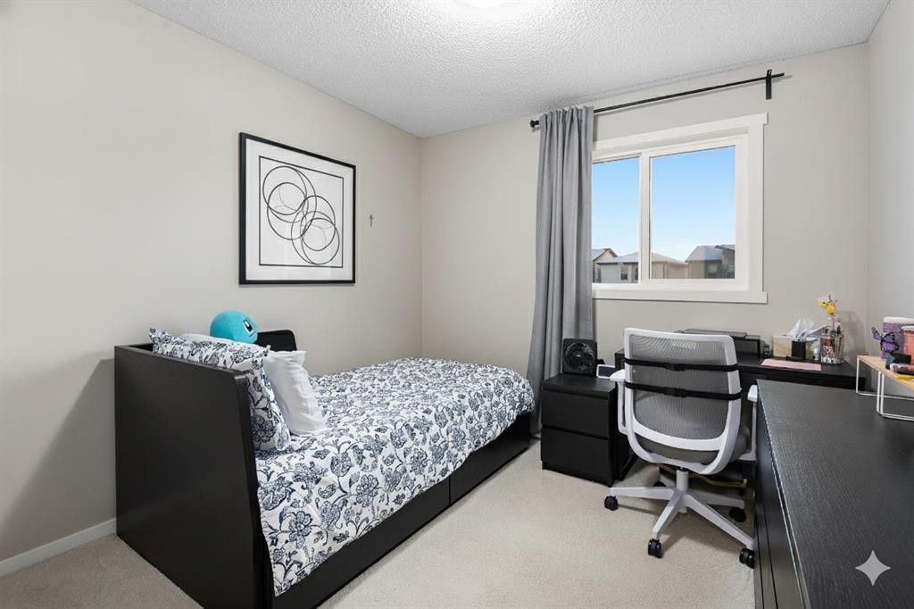 802 Walden Drive Se, Calgary, AB - Indoor Photo Showing Bedroom