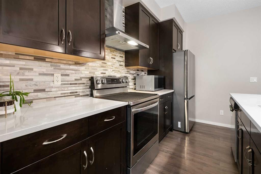 802 Walden Drive Se, Calgary, AB - Indoor Photo Showing Kitchen With Upgraded Kitchen