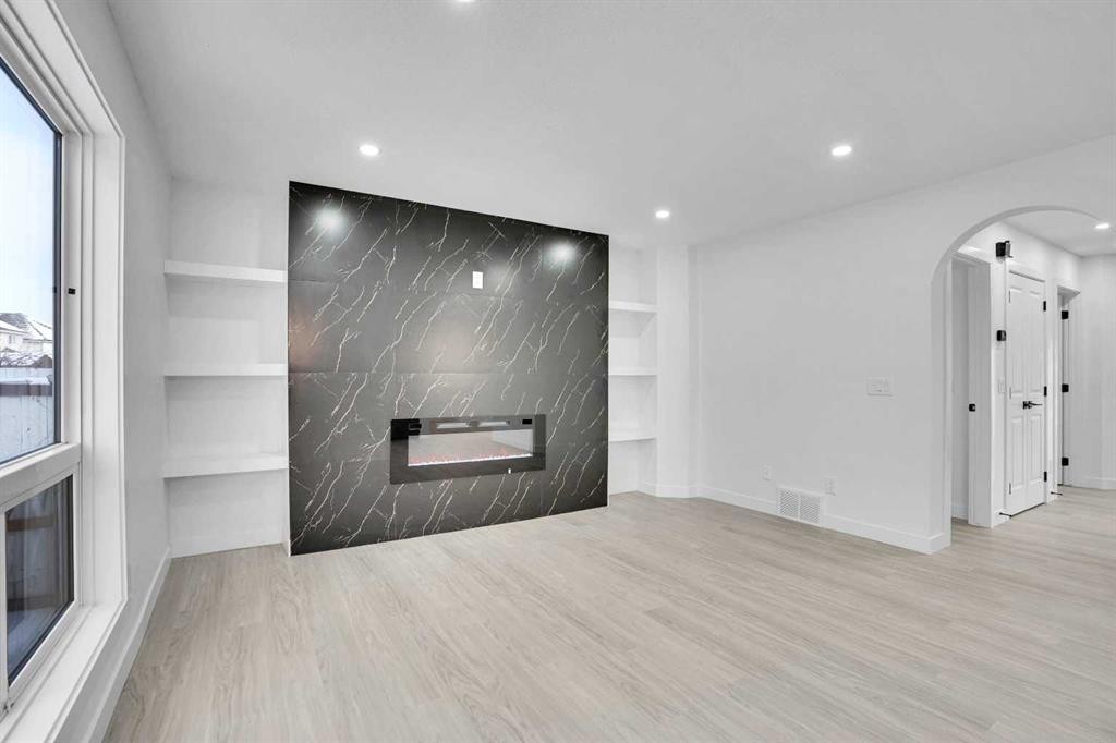 55 Coral Springs Close Ne, Calgary, AB - Indoor With Fireplace