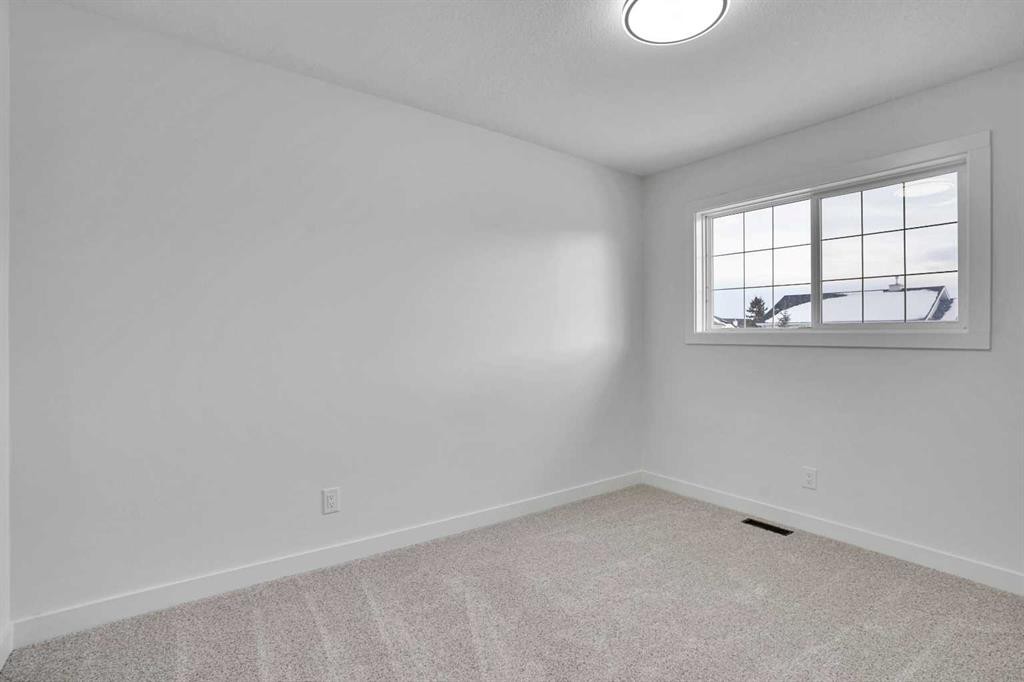 55 Coral Springs Close Ne, Calgary, AB - Indoor Photo Showing Other Room