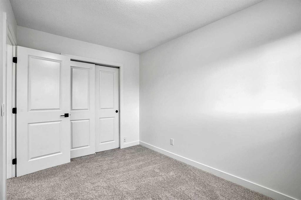 55 Coral Springs Close Ne, Calgary, AB - Indoor Photo Showing Other Room