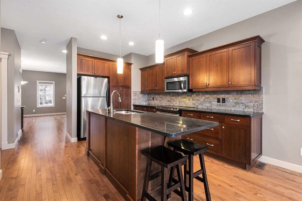 5628 Henwood Street Sw, Calgary, AB - Indoor Photo Showing Kitchen With Stainless Steel Kitchen