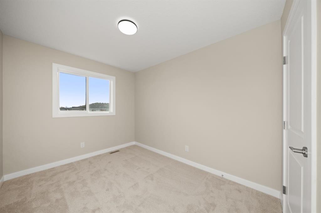 29 Sora Gate Se, Calgary, AB - Indoor Photo Showing Other Room