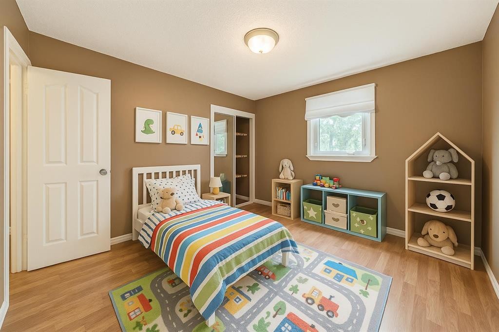 310 Highwood Village Place Nw, High River, AB - Indoor Photo Showing Bedroom