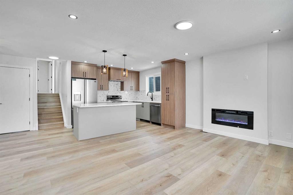 139 Castleglen Way Ne, Calgary, AB - Indoor With Fireplace