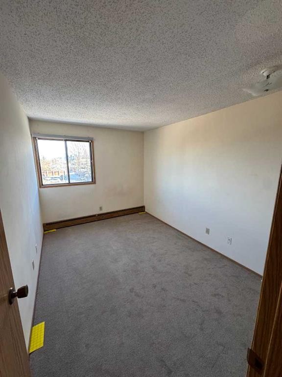 1-7-2515 First Avenue Nw, Calgary, AB - Indoor Photo Showing Other Room