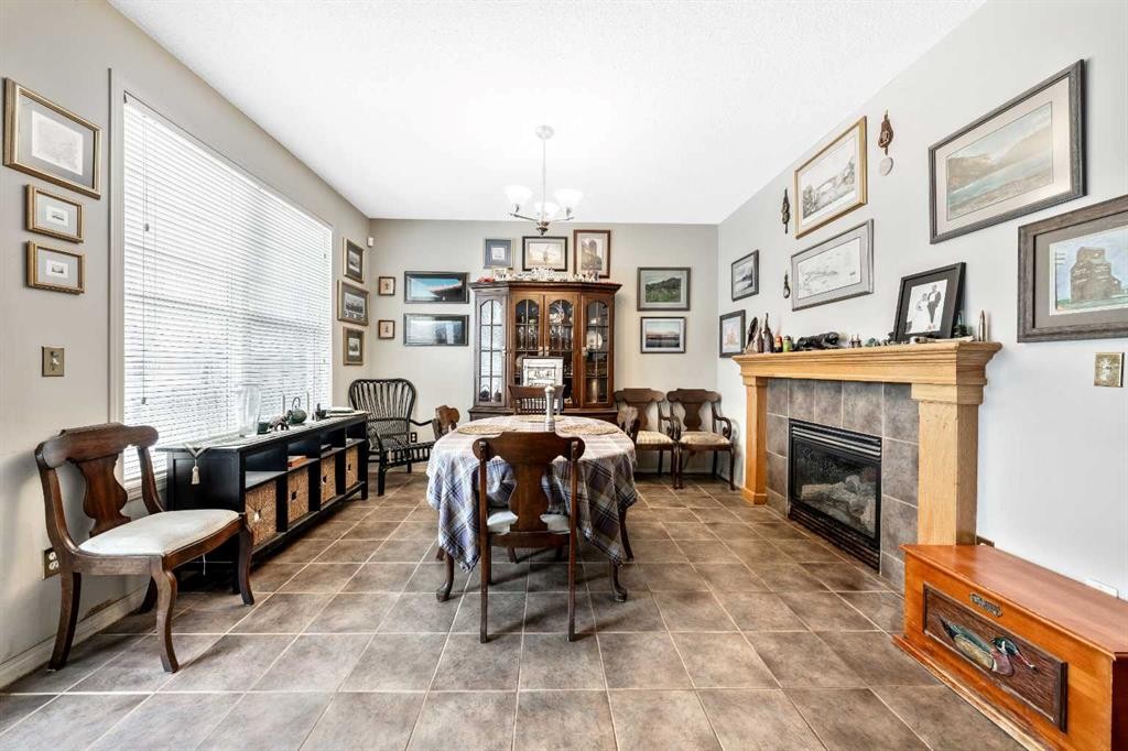 40 Mckinnon Street Nw, Langdon, AB - Indoor With Fireplace