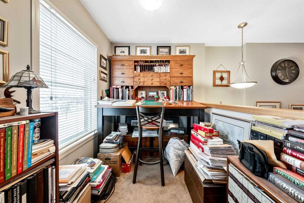 40 Mckinnon Street Nw, Langdon, AB - Indoor Photo Showing Other Room