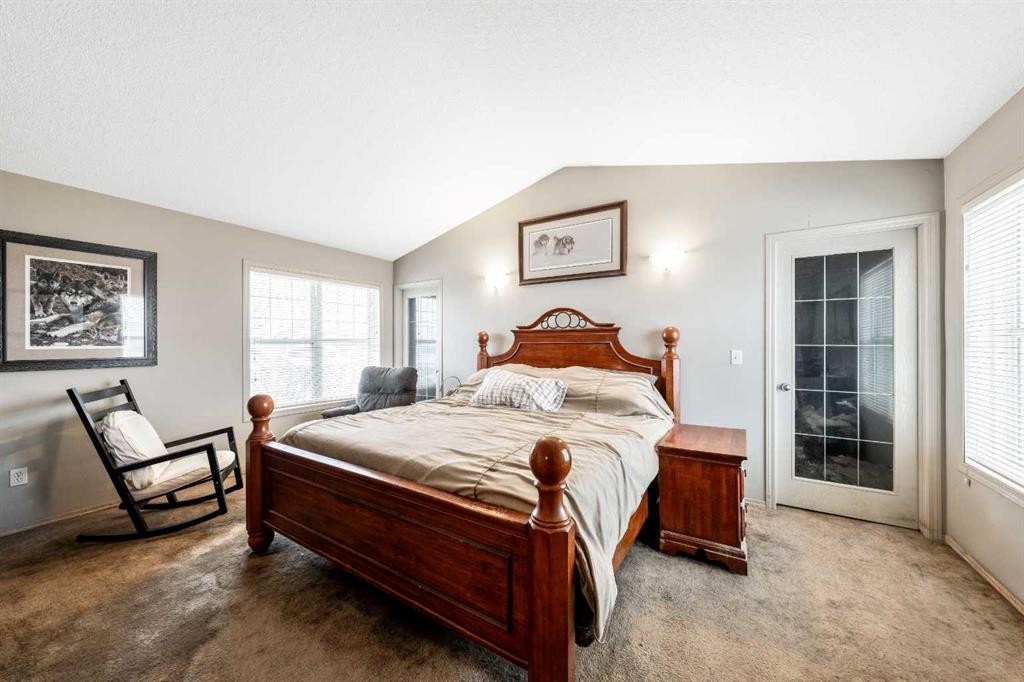 40 Mckinnon Street Nw, Langdon, AB - Indoor Photo Showing Bedroom