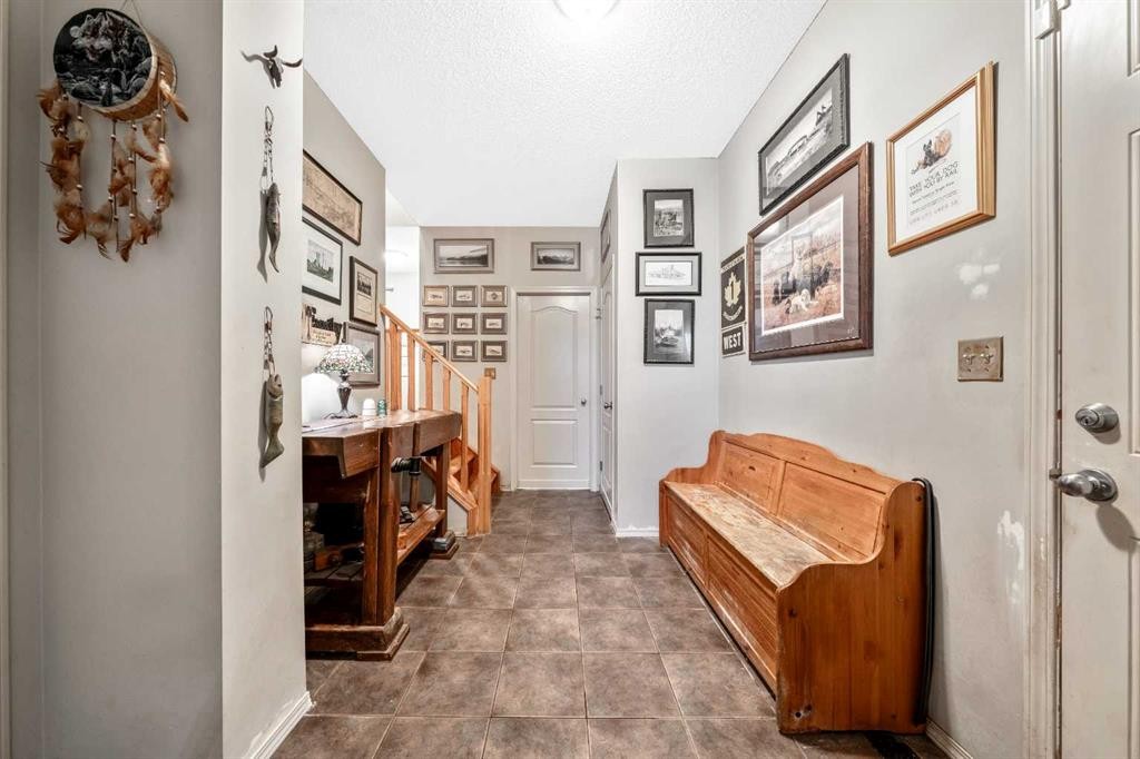 40 Mckinnon Street Nw, Langdon, AB - Indoor Photo Showing Other Room