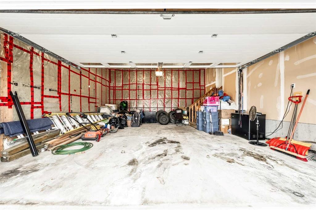 40 Mckinnon Street Nw, Langdon, AB - Indoor Photo Showing Garage