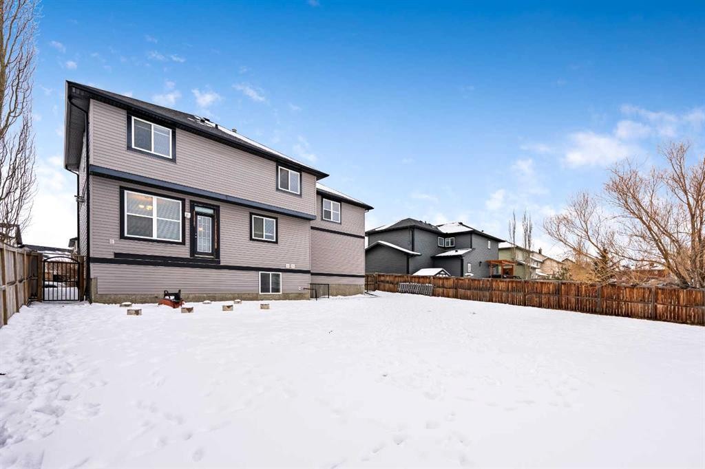 40 Mckinnon Street Nw, Langdon, AB - Outdoor With Exterior