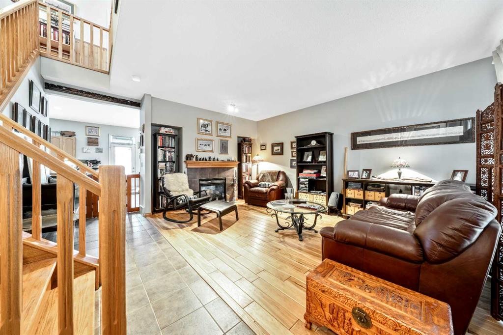 40 Mckinnon Street Nw, Langdon, AB - Indoor With Fireplace