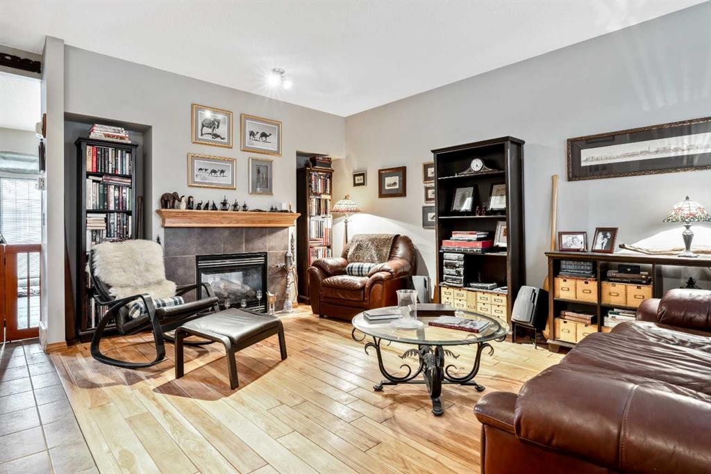 40 Mckinnon Street Nw, Langdon, AB - Indoor Photo Showing Living Room With Fireplace